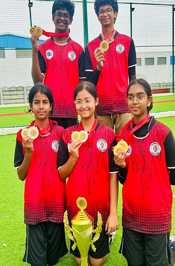 AECS Magnolia Maaruti students with their medals at the South Zone Flying Tennis National Championship 2026