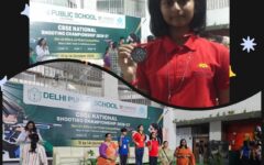 Sanvi R. P. of AECS Magnolia Maaruti Public School with her bronze medal and on the podium at the CBSE National Shooting Championship 2026
